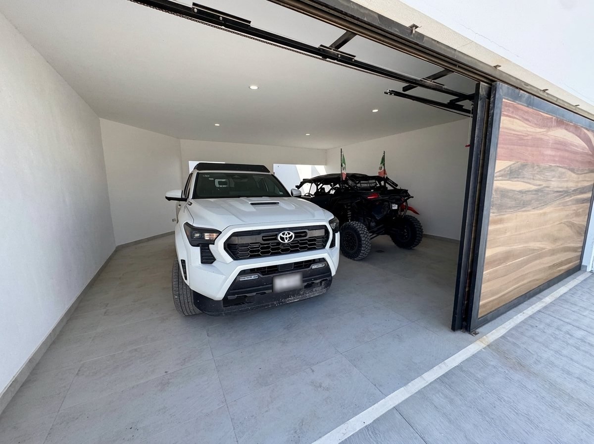 Garage with room for a truck and a UTV